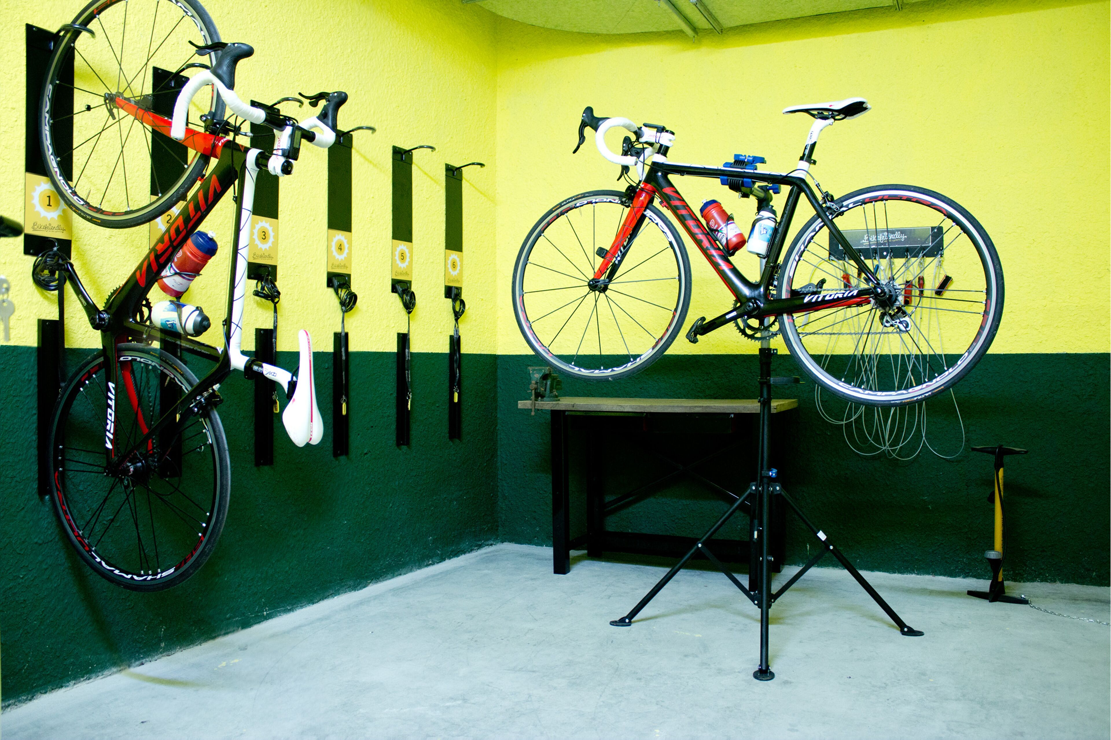 A bicycle repair station with tools and a bike stand.