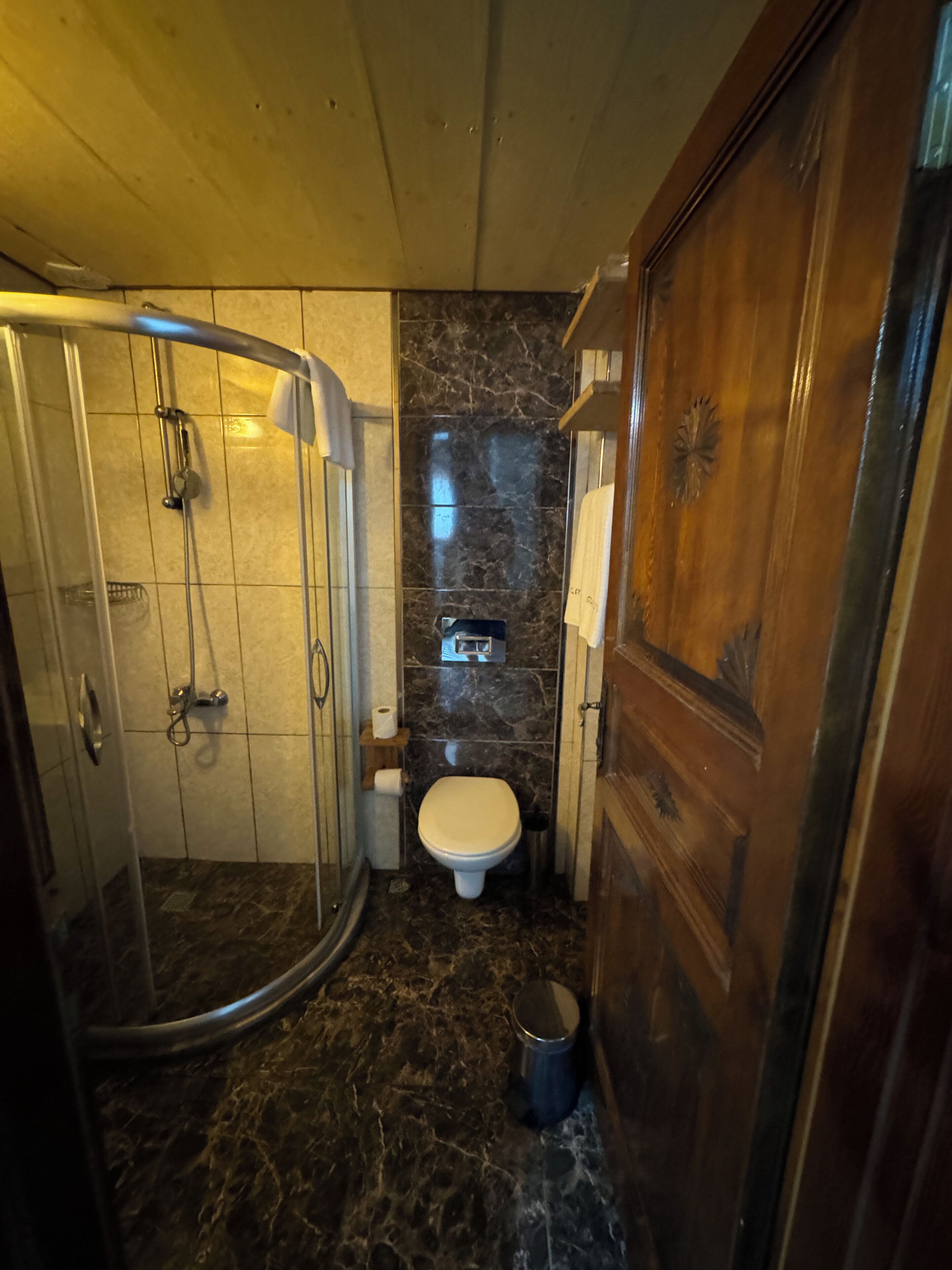 economy room | bathroom | shower, free toiletries, hair dryer, slippers