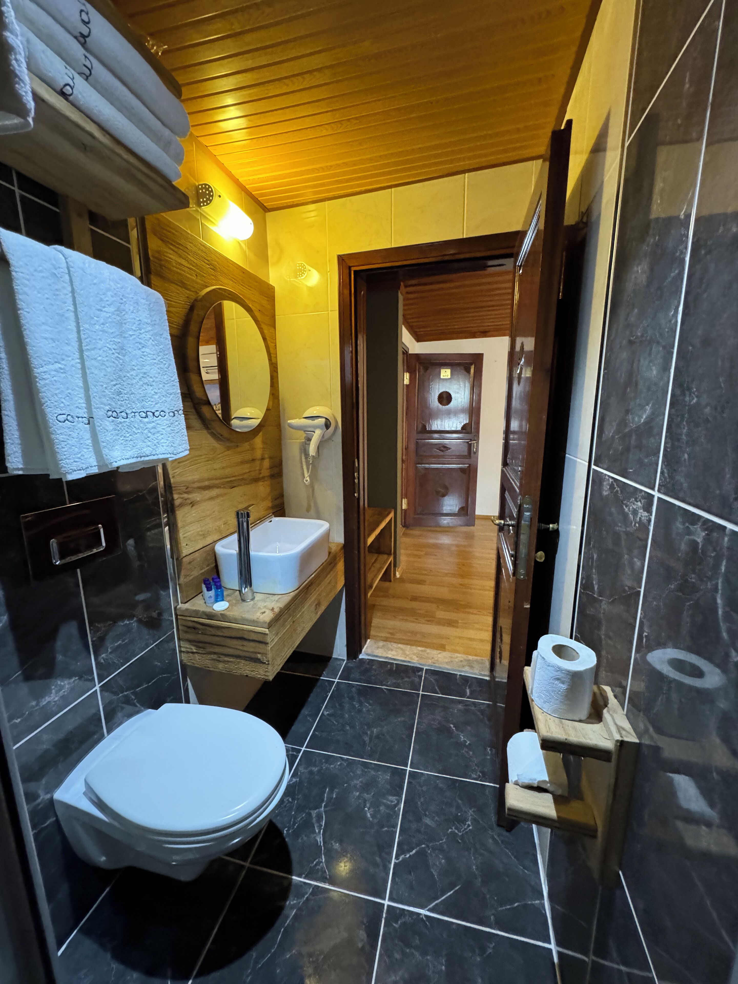 shower, free toiletries, hair dryer, slippers