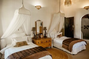Premium bedding, in-room safe, individually decorated - Amanzi Lodge (Harare)