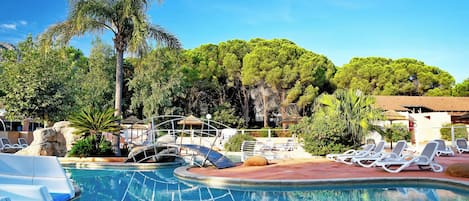 Outdoor pool, a heated pool, open 9:00 AM to 8:00 PM, sun loungers