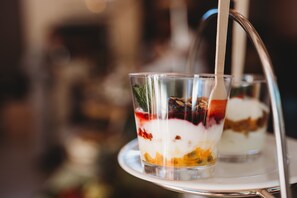 Two layered parfait glasses on a white tray. - Sandalwood Lodge (Harare)