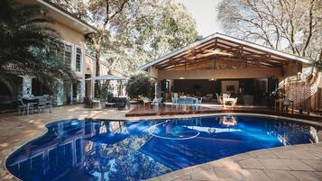 Outdoor pool, pool umbrellas, pool loungers