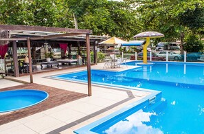 Seasonal outdoor pool, pool umbrellas, pool loungers