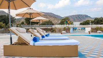 Outdoor pool, open 6:30 AM to 6:00 PM, pool umbrellas, sun loungers