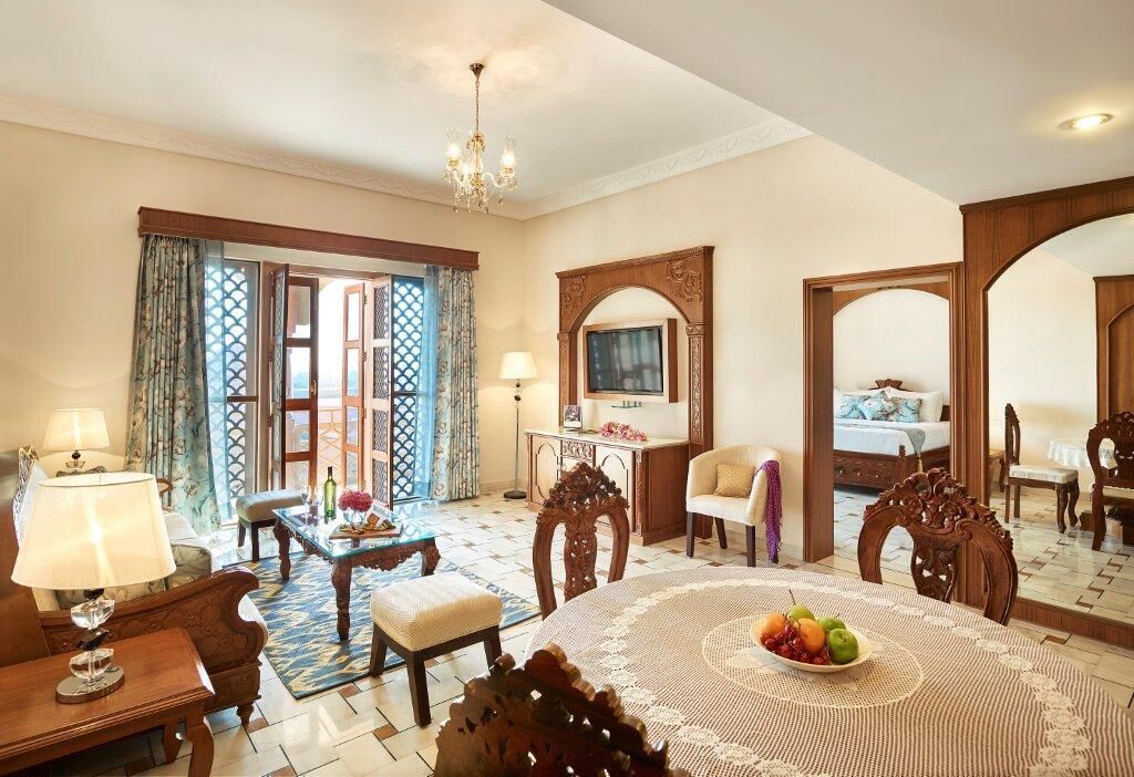 Executive Suite, 1 Double Bed (with Sitout) | Living area | 36-inch LED TV with satellite channels, TV