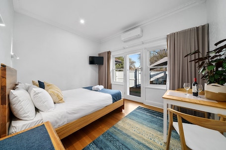 Benson House | Premium bedding, desk, laptop workspace, soundproofing