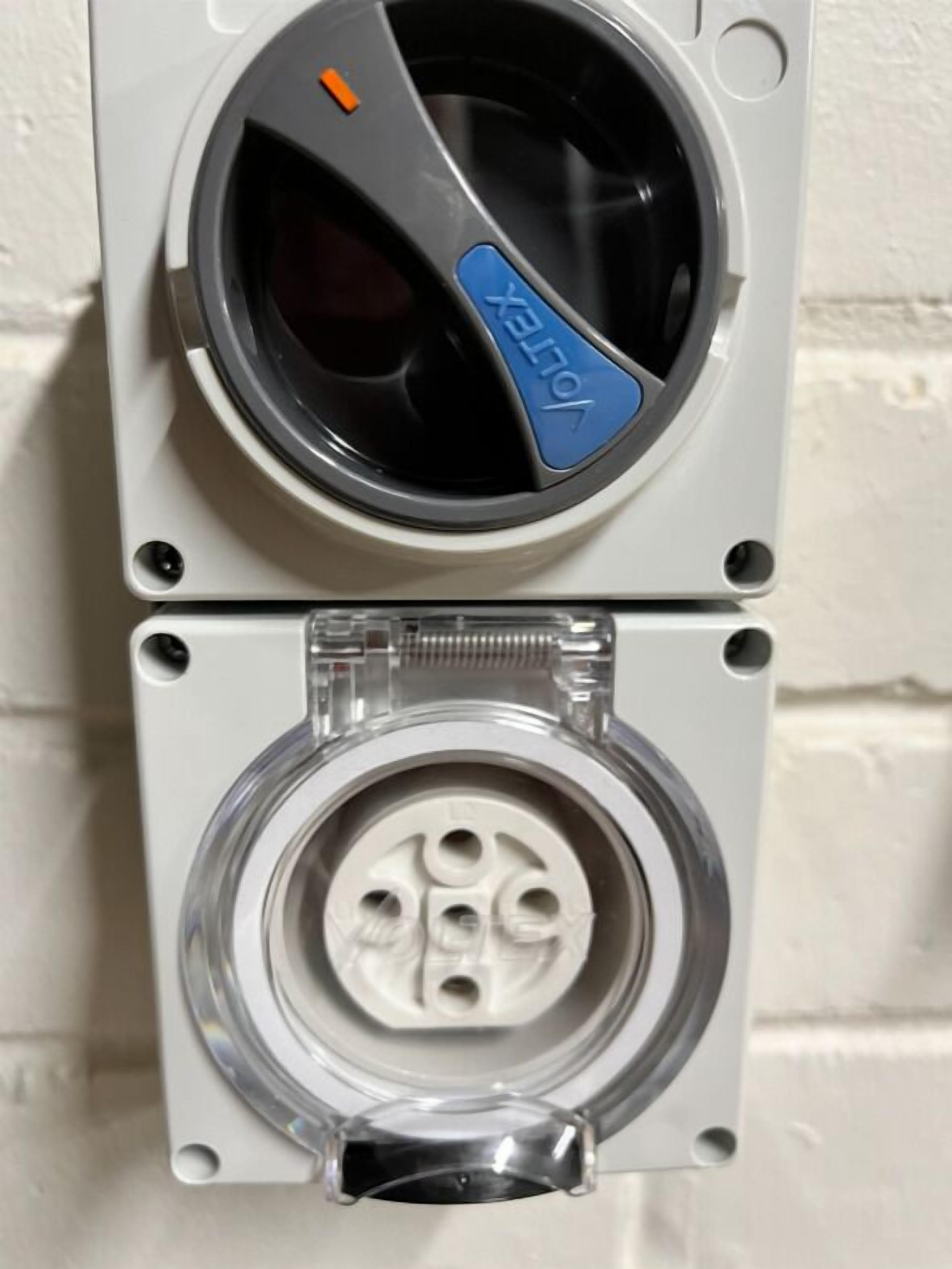 A utility meter with a circular dial and a transparent cover.