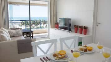 Apartment, 2 Bedrooms, Sea View | Individually decorated, blackout drapes, iron/ironing board, free WiFi