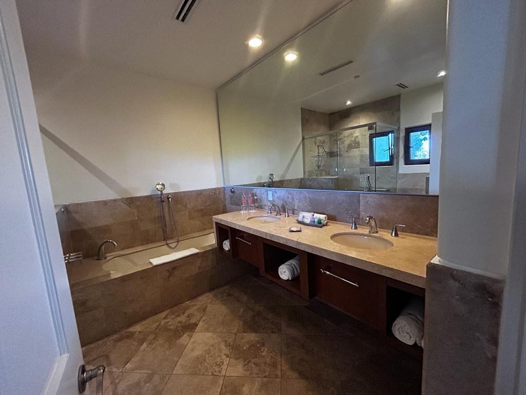 superior double room, 2 queen beds | bathroom | separate bathtub and shower, deep-soaking bathtub, free toiletries