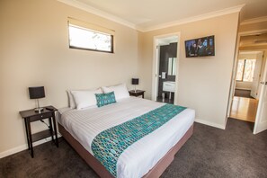 Premium bedding, blackout drapes, iron/ironing board