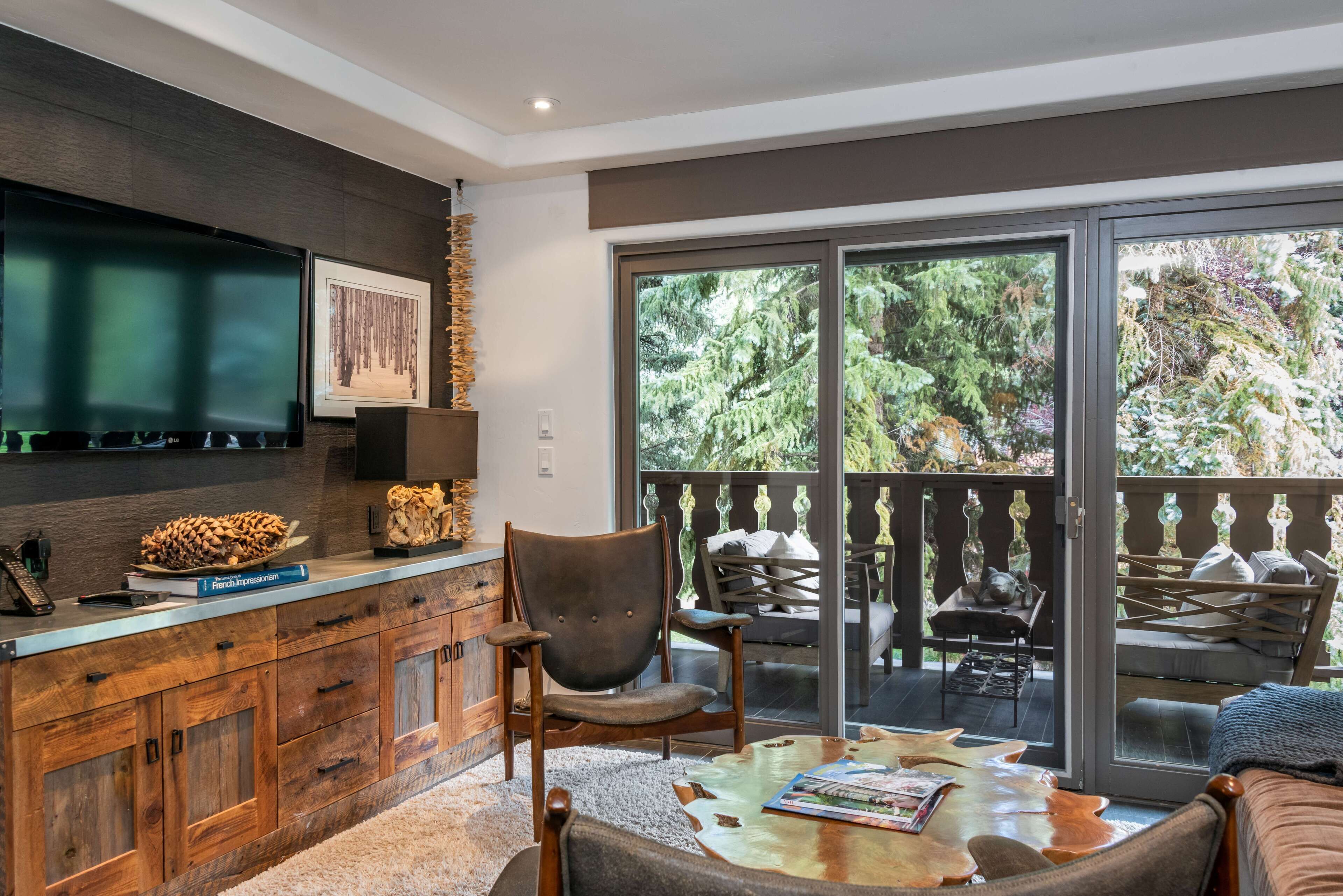Condo, Fireplace (Bridge Street306) | Living area | Flat-screen TV