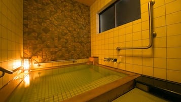 Separate tub and shower, free toiletries, hair dryer, slippers