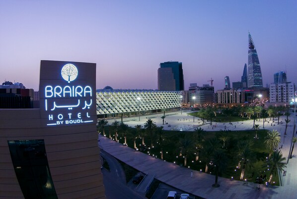 A hotel sign with a tree logo and the name "BRAIRA HOTEL BY BOUDL." - Braira Hotel Olaya (Riyadh)