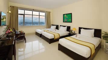 Deluxe Triple Room, 1 Bedroom, Non Smoking, City View | Minibar, desk, iron/ironing board, rollaway beds