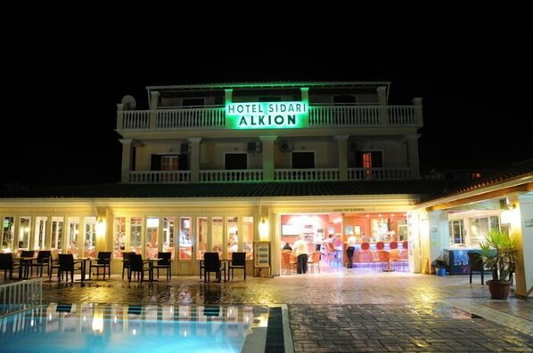 Outdoor pool, open 8 AM to 7 PM, pool umbrellas, pool loungers