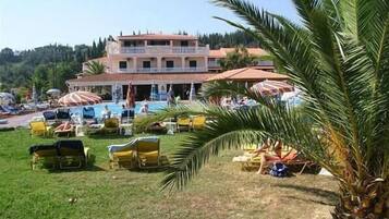 Outdoor pool, open 8 AM to 7 PM, pool umbrellas, sun loungers
