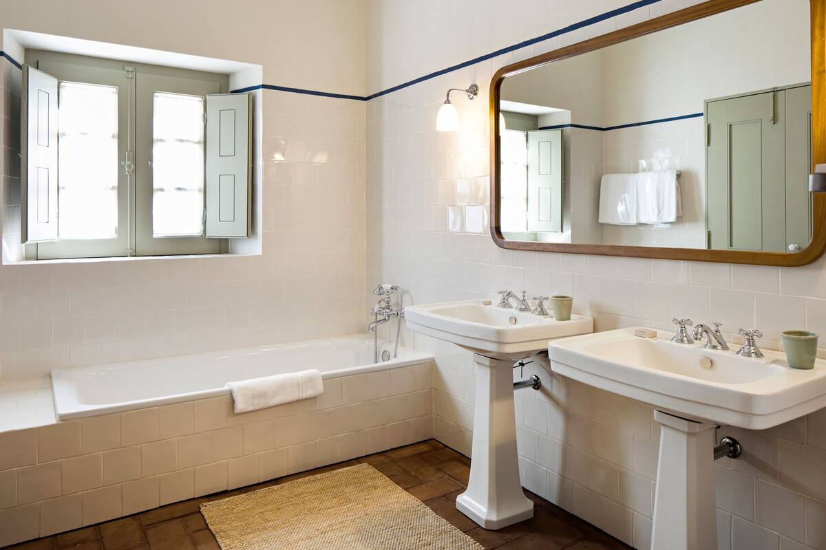 hair dryer, bathrobes, slippers, bidet