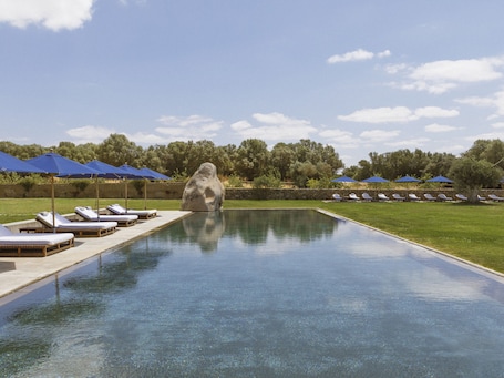 Outdoor pool, open 9:00 AM to 6:00 PM, sun loungers