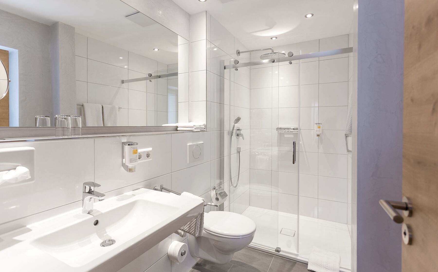 eco-friendly toiletries, hair dryer, towels, soap