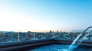 Seasonal outdoor pool, pool loungers
