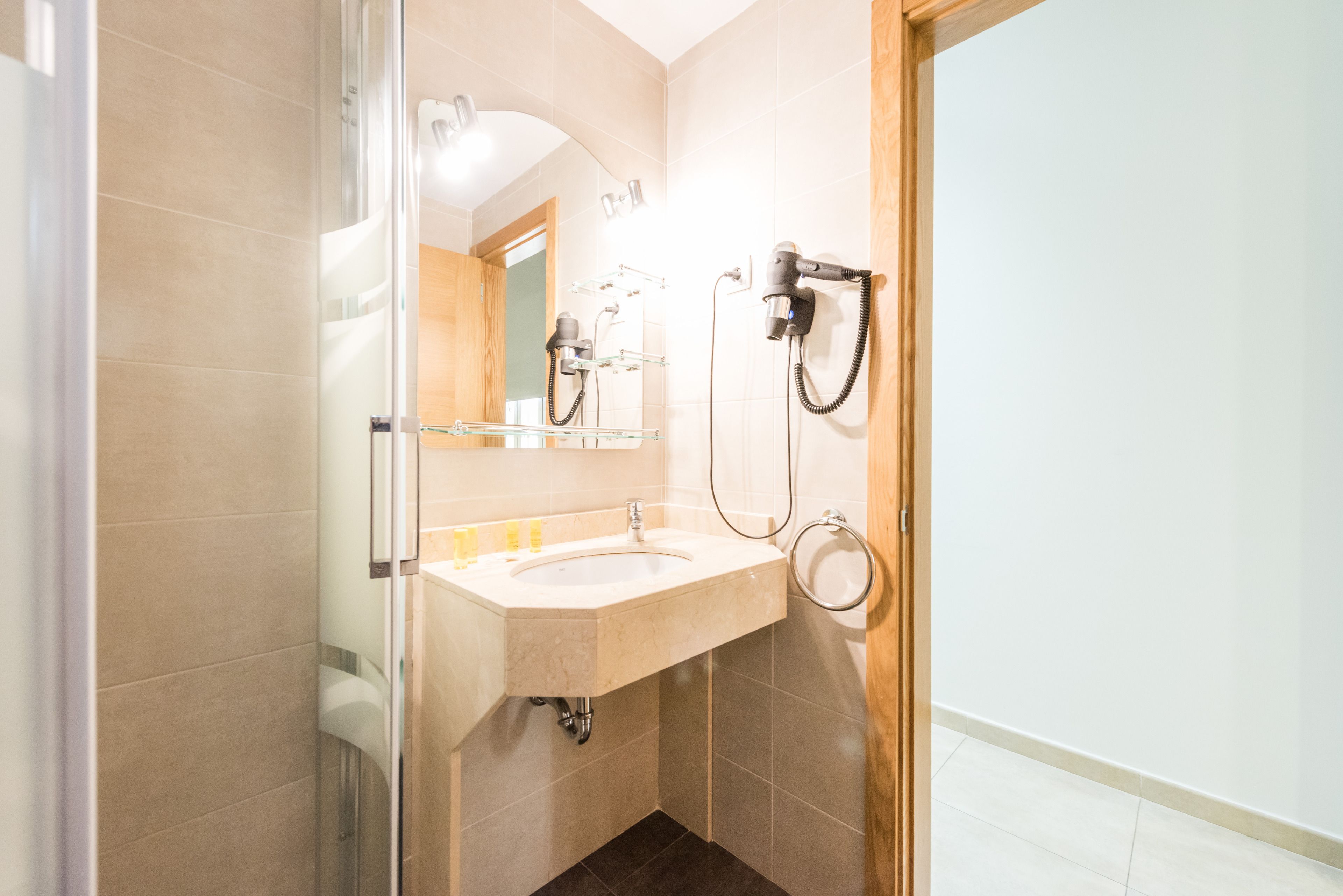 Shower, free toiletries, hair dryer, towels