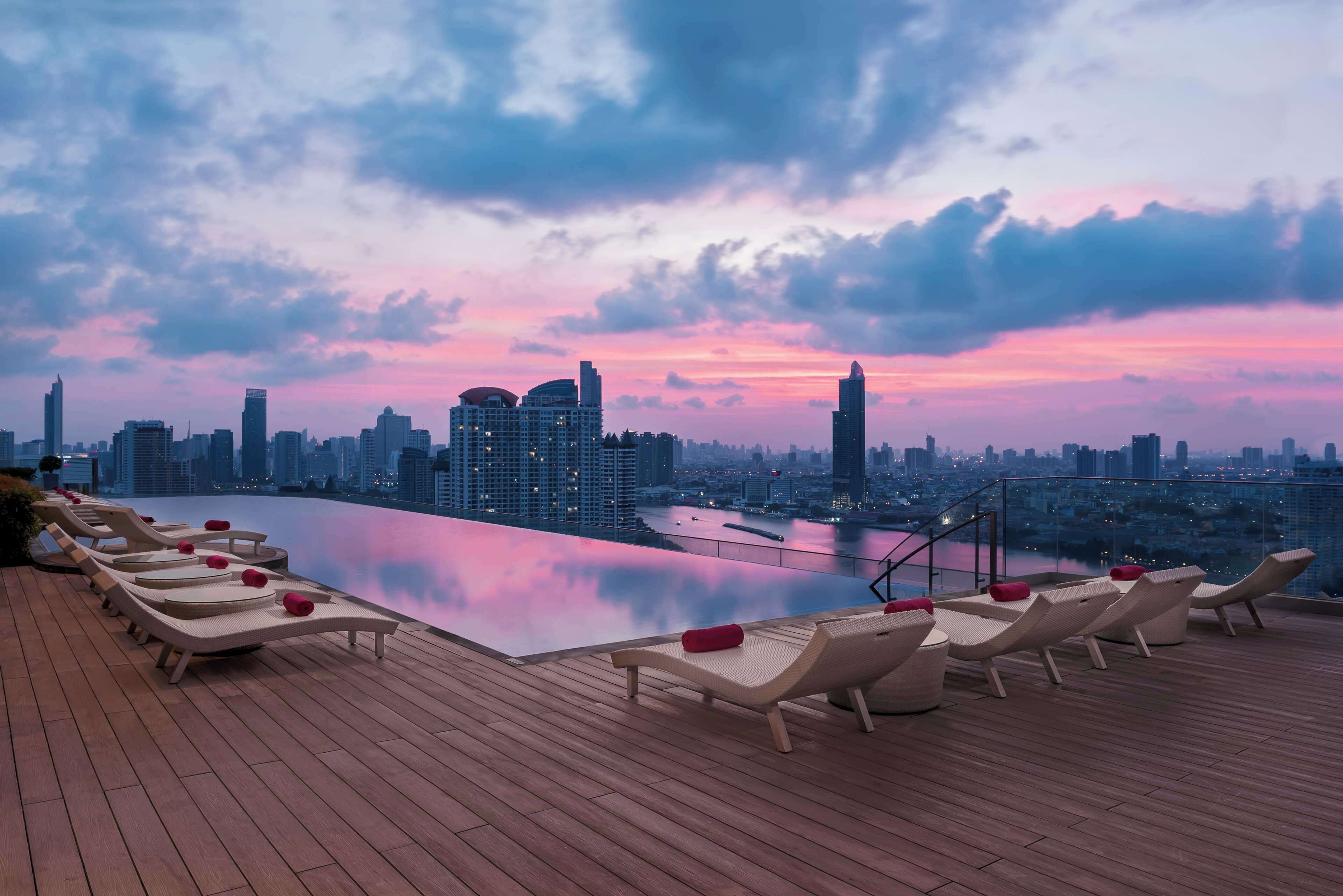 outdoor pool, pool umbrellas, pool loungers