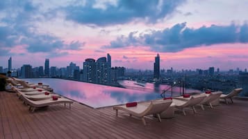 Outdoor pool, pool umbrellas, pool loungers