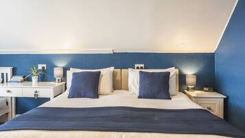 Family Room, Sea View | Individually decorated, individually furnished, iron/ironing board