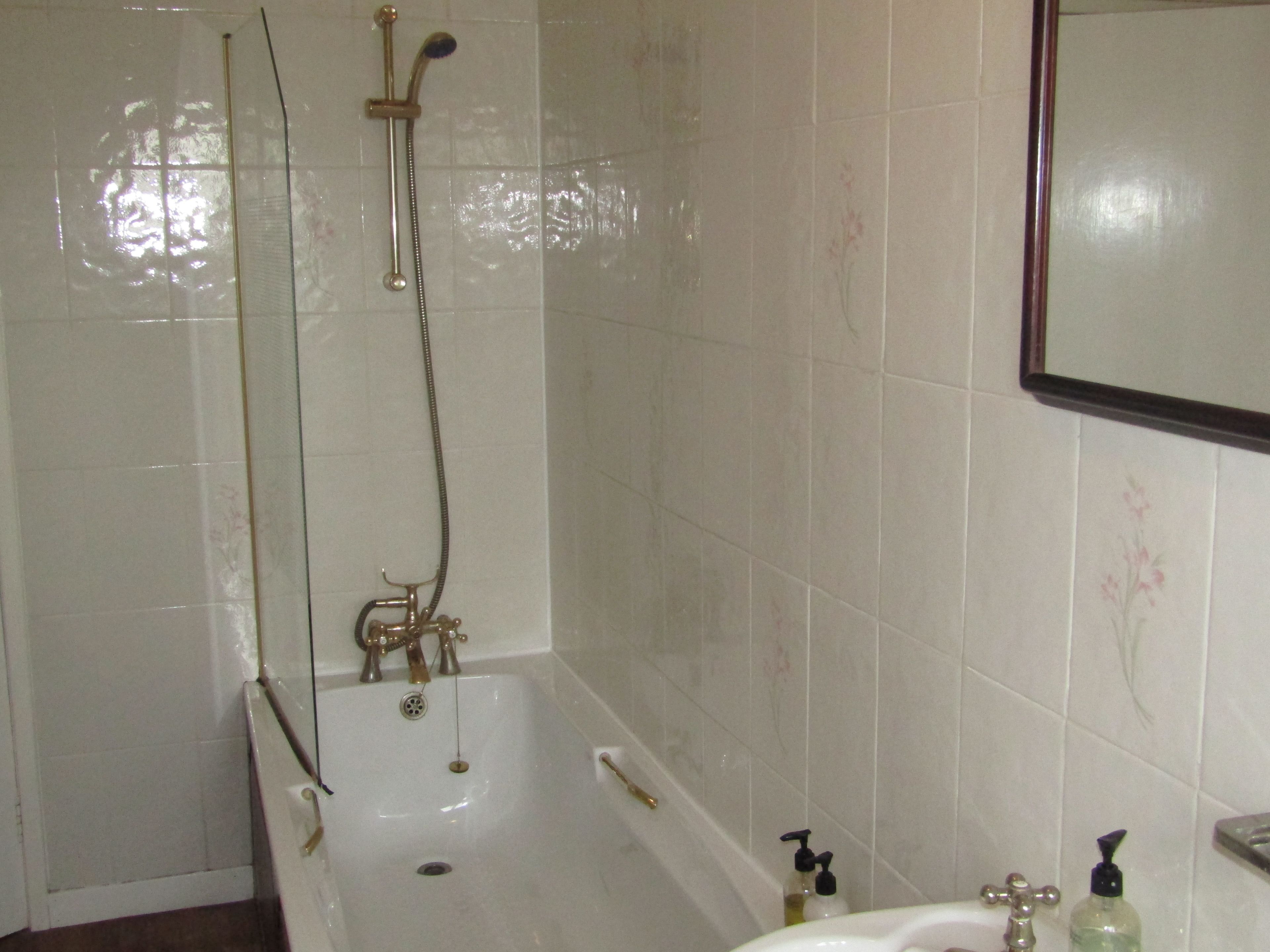 family room with 4 poster bed, sleeps 3 | bathroom | hair dryer, bathrobes, towels