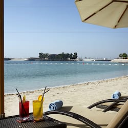 Apartment, 1 King Bed, City View | Beach | Private beach, white sand, sun loungers, beach umbrellas