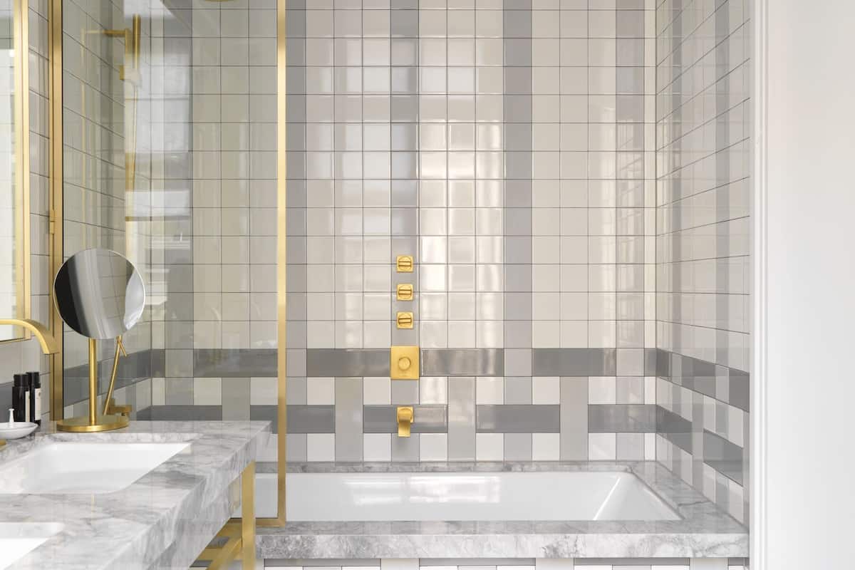 suite | bathroom | designer toiletries, hair dryer, bathrobes, slippers