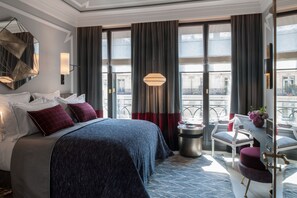 Habitación superior | Ropa de cama de alta calidad y minibar 