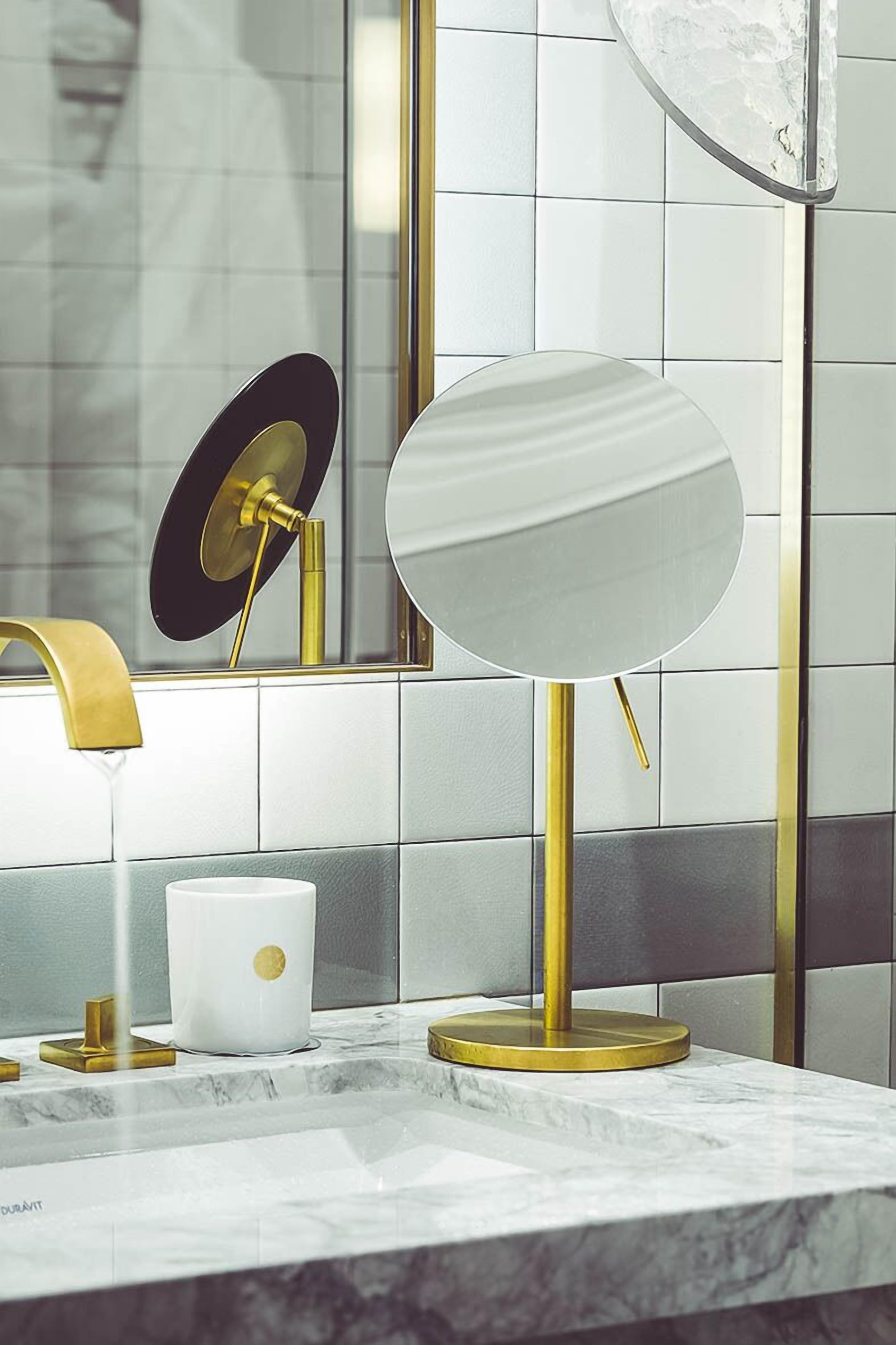 designer toiletries, hair dryer, bathrobes, slippers