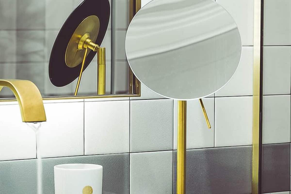 designer toiletries, hair dryer, bathrobes, slippers