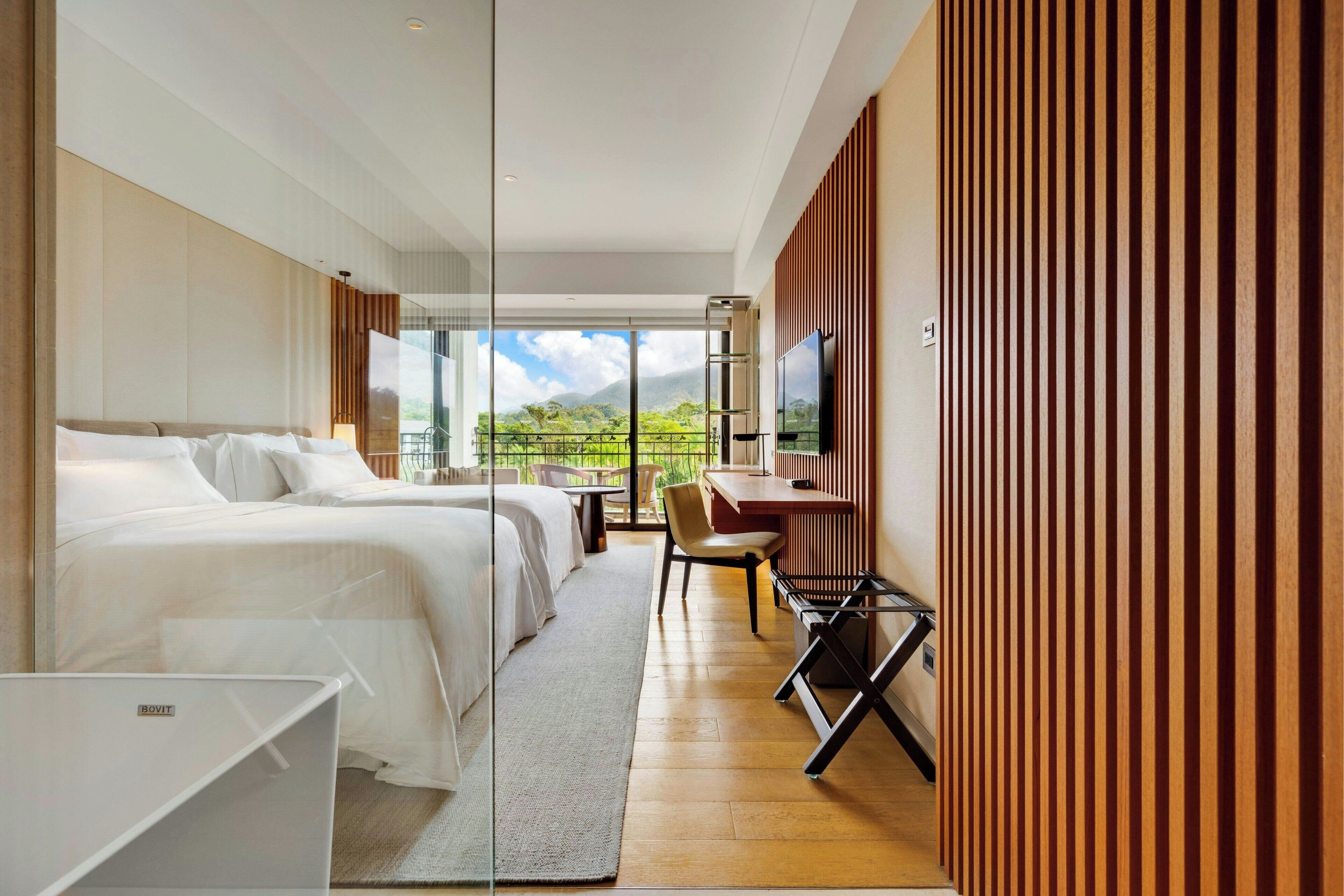 Chambre, 2 lits jumeaux, vue sur le complexe | Articles de minibar gratuits, coffre-fort pour ordinateur portable