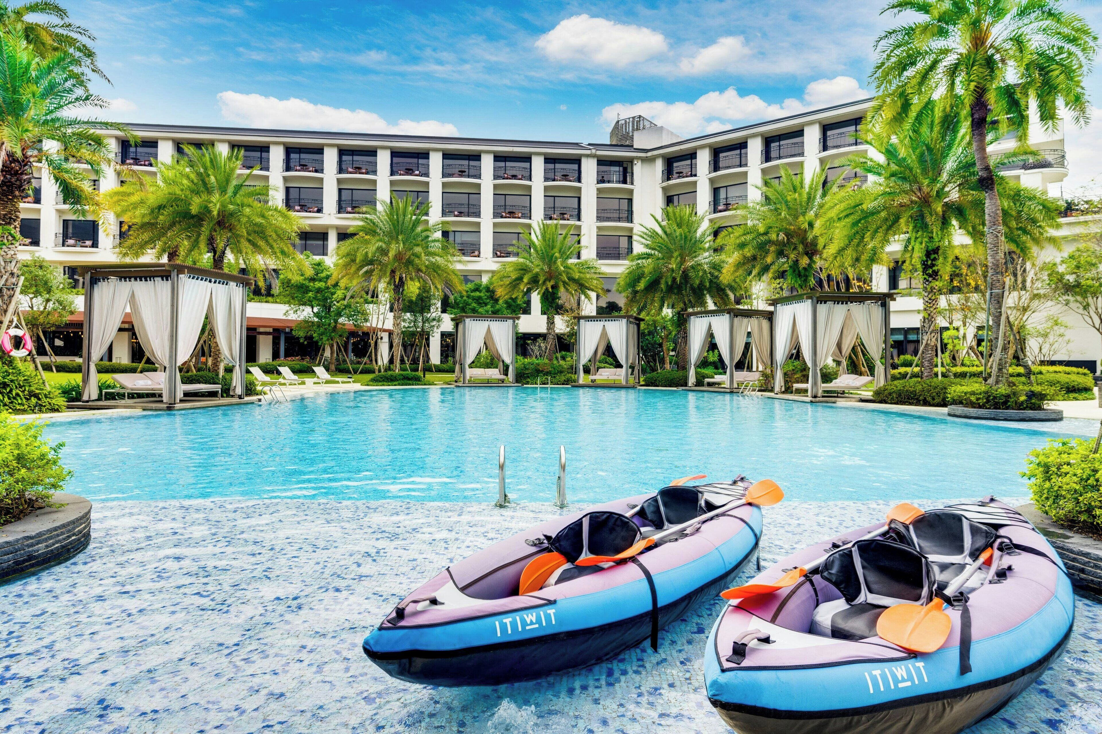 Indoor pool, outdoor pool, pool umbrellas, sun loungers