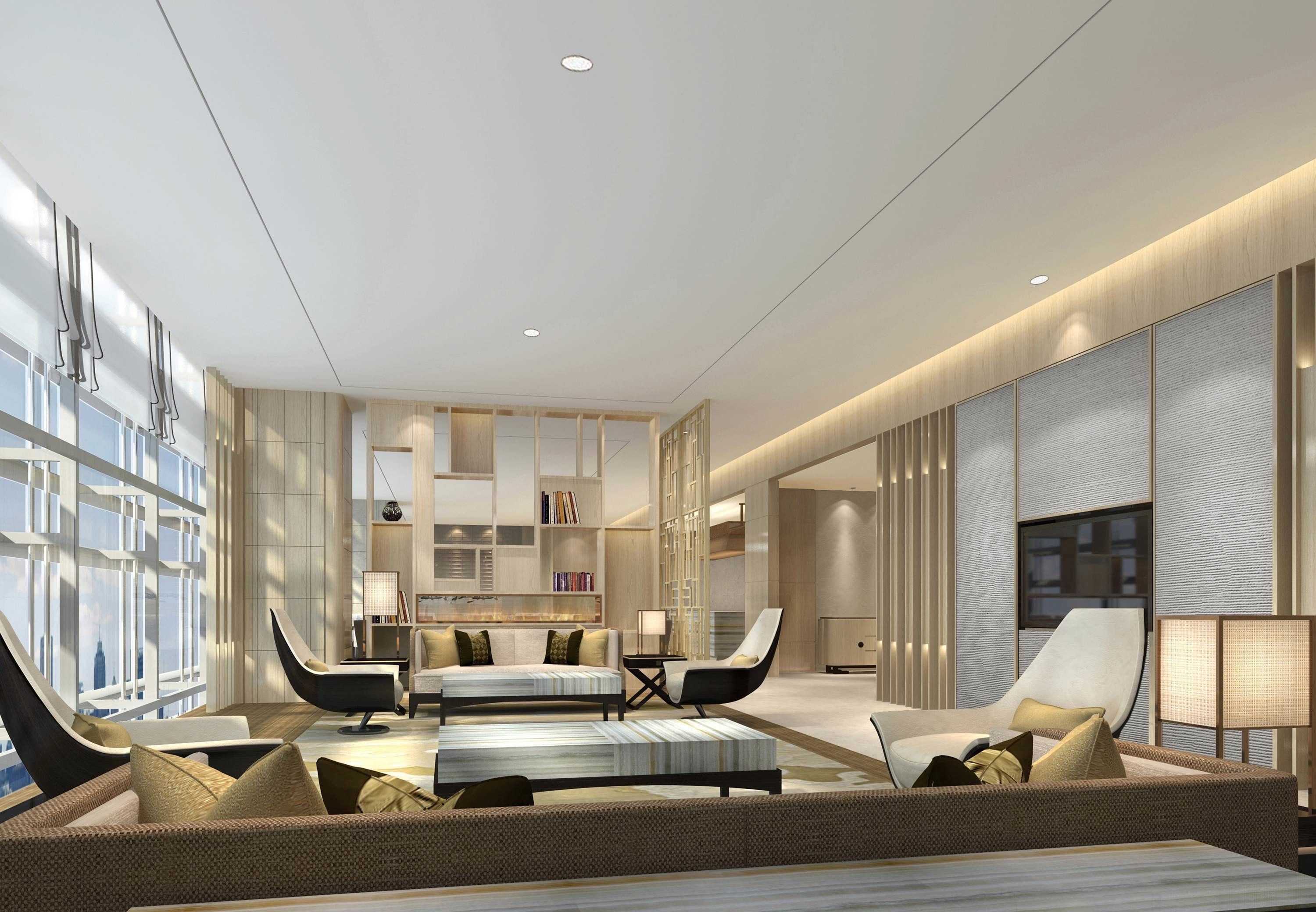 Un salon moderne comprenant un canapé, des fauteuils, une table basse et une cheminée.