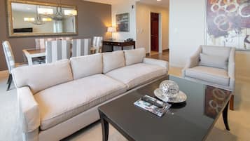 Three-Bedroom Executive Suite with Den, Non-Smoking | Living area | Flat-screen TV