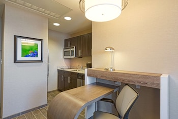 Full-size fridge, microwave, stovetop, dishwasher at Homewood Suites Houston Downtown