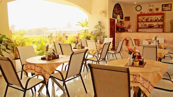 Breakfast and dinner served, international cuisine