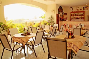 Breakfast and dinner served, international cuisine