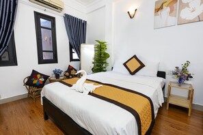 Habitación doble Deluxe | Minibar, caja de seguridad en la habitación, escritorio y wifi gratis 