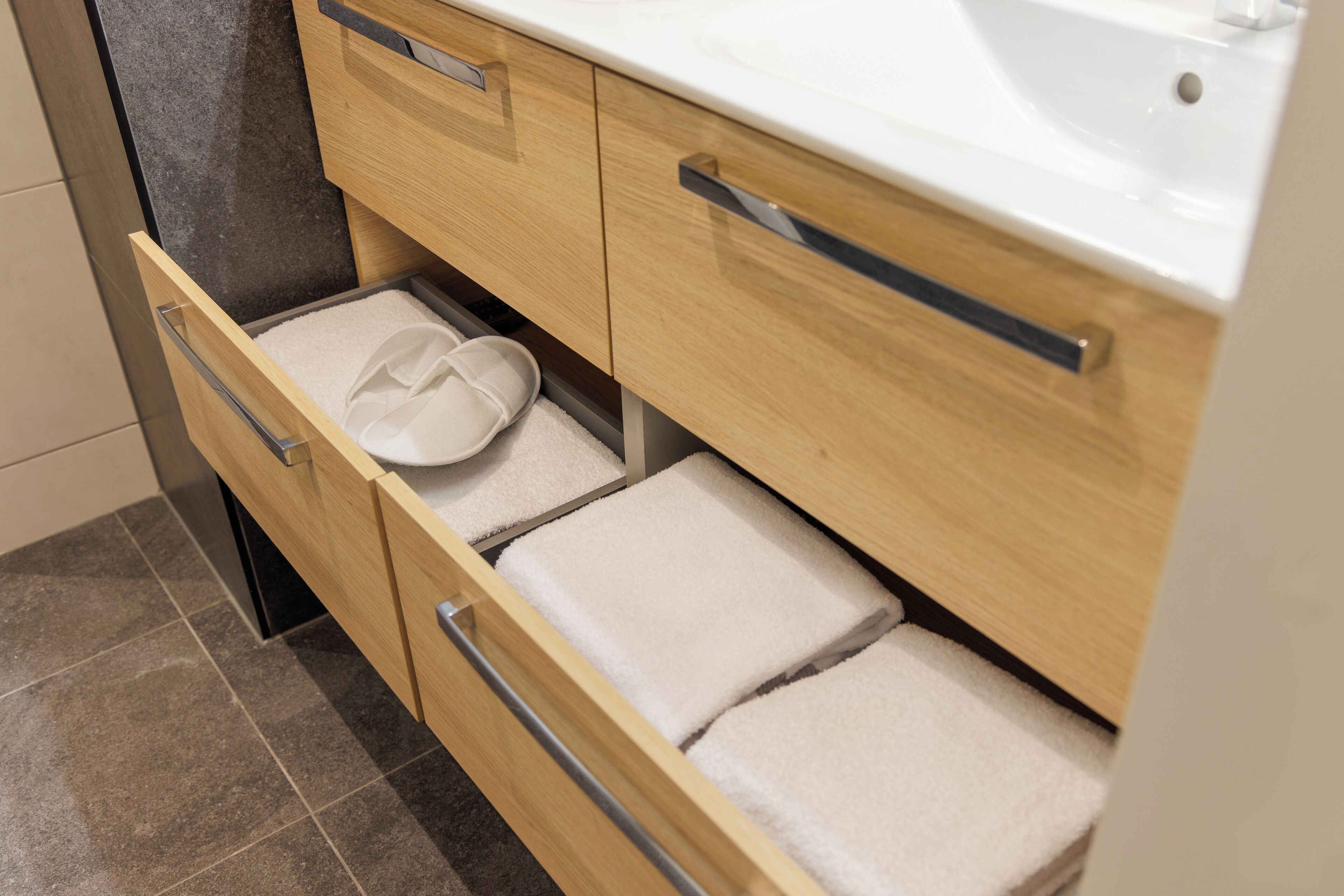 superior room | bathroom | hair dryer, towels, toilet paper