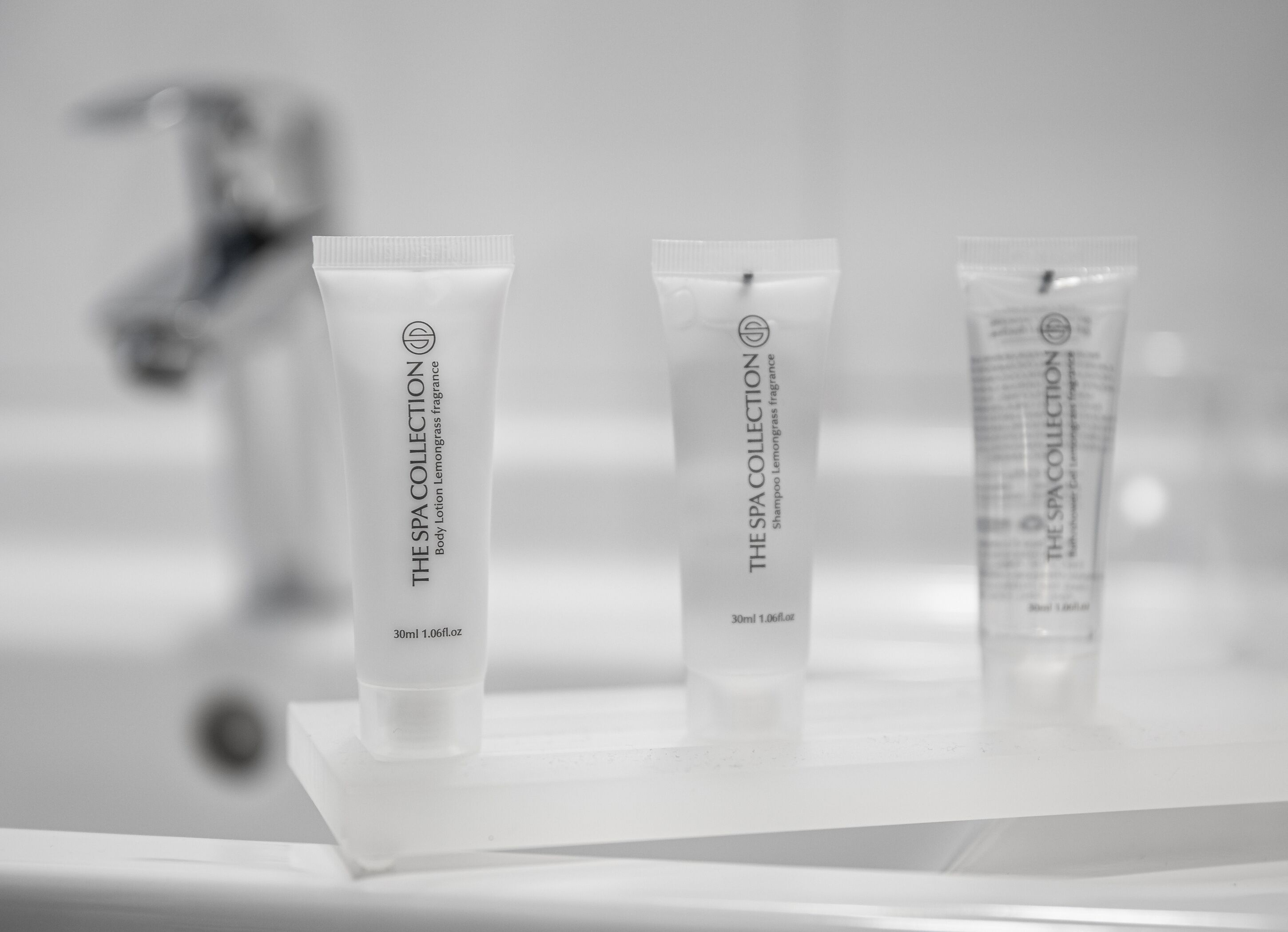 family room | bathroom | shower, designer toiletries, hair dryer, towels