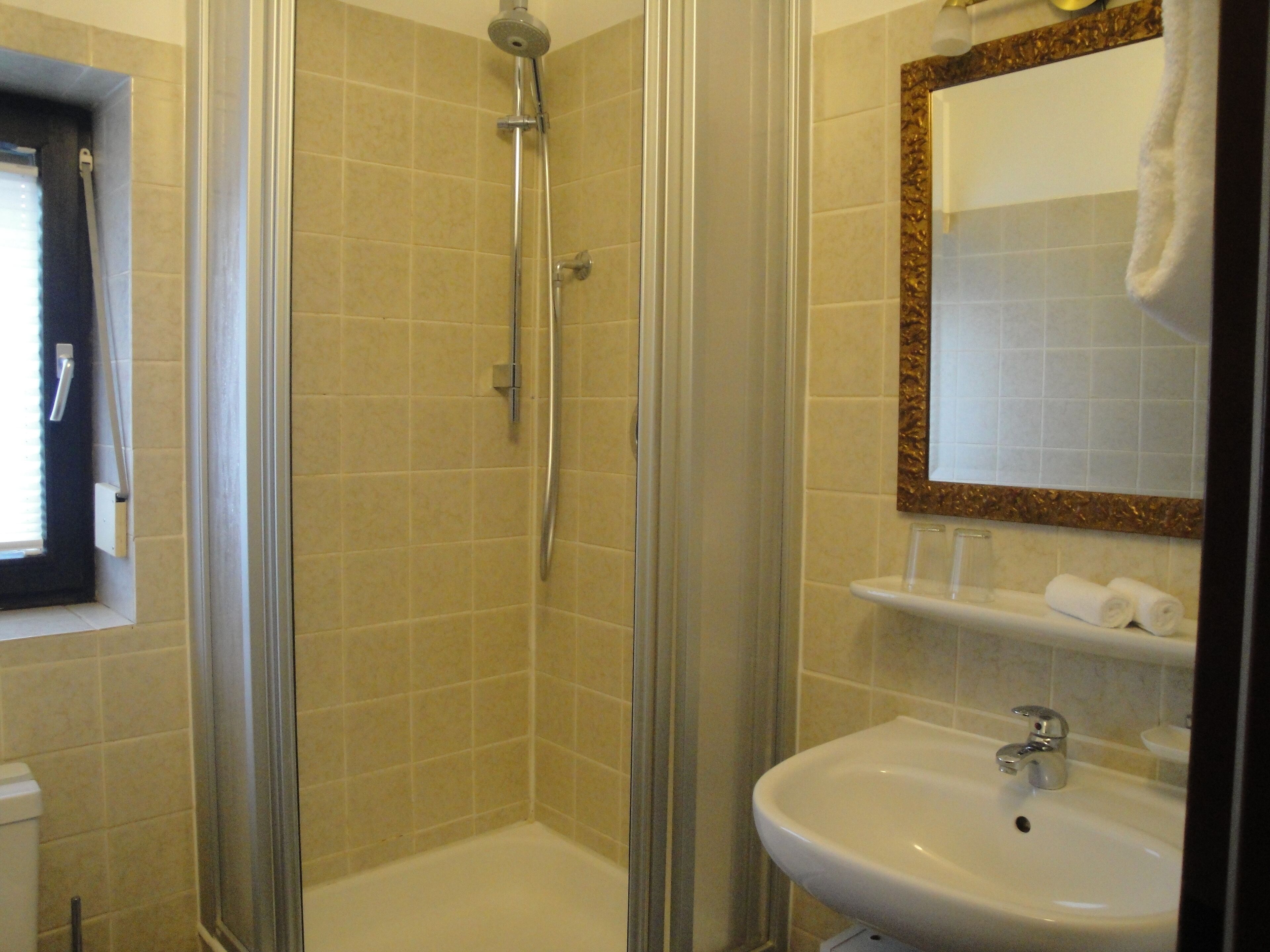 comfort double room | bathroom | shower, hair dryer, slippers, towels