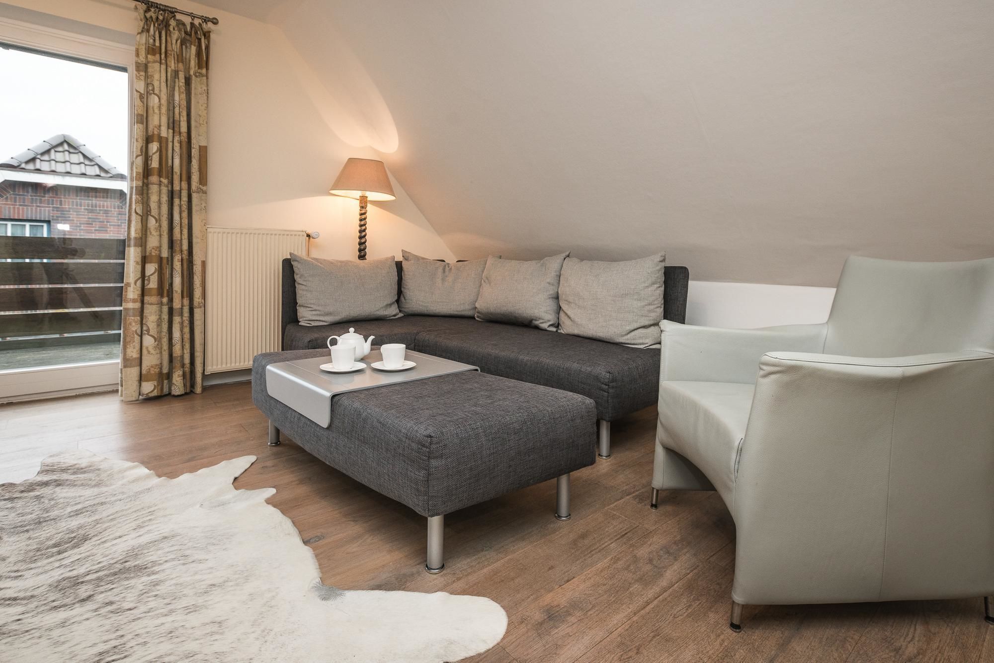 family triple room, 1 bedroom | living area | tv