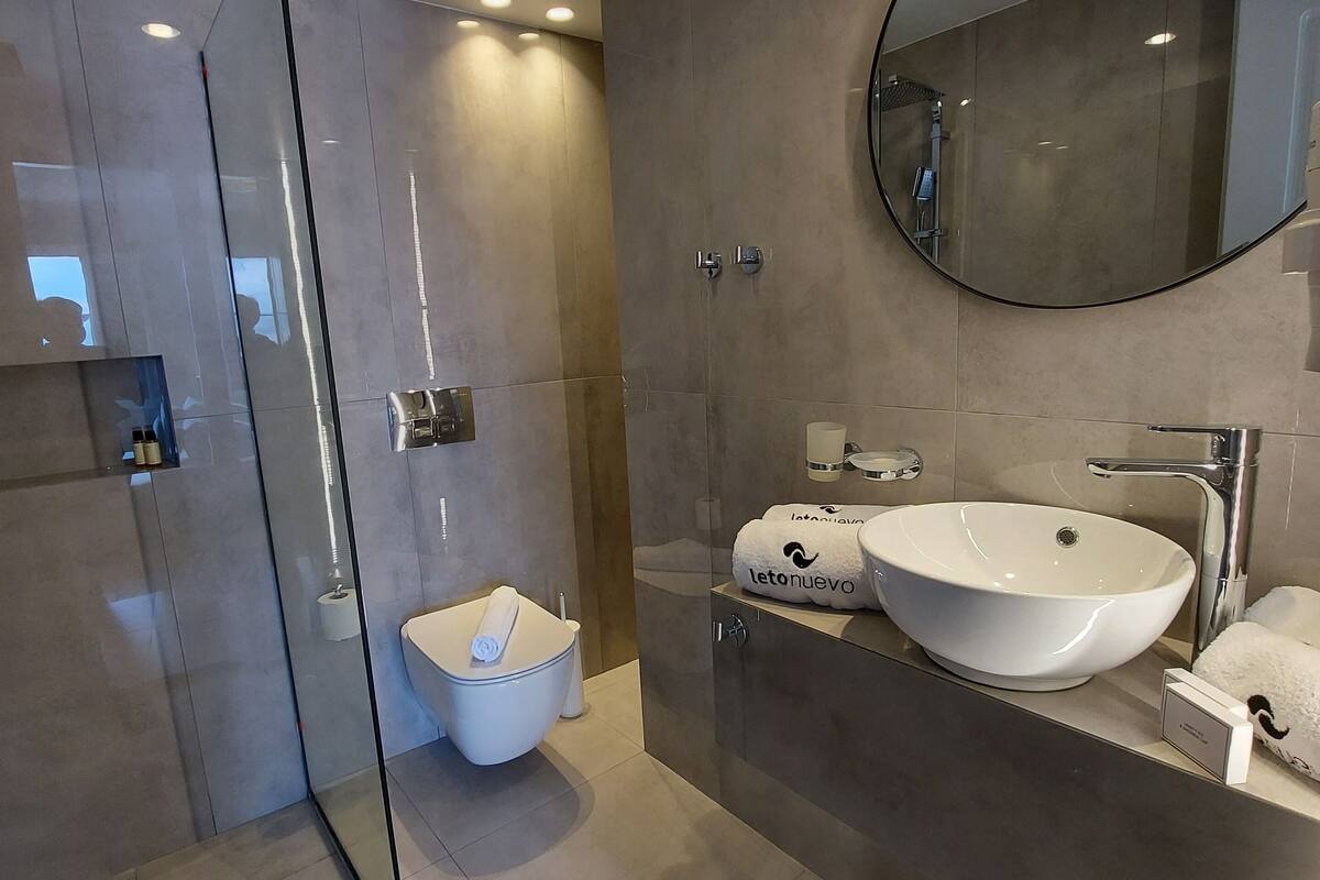 double room, sea view | bathroom | free toiletries, hair dryer, slippers, towels