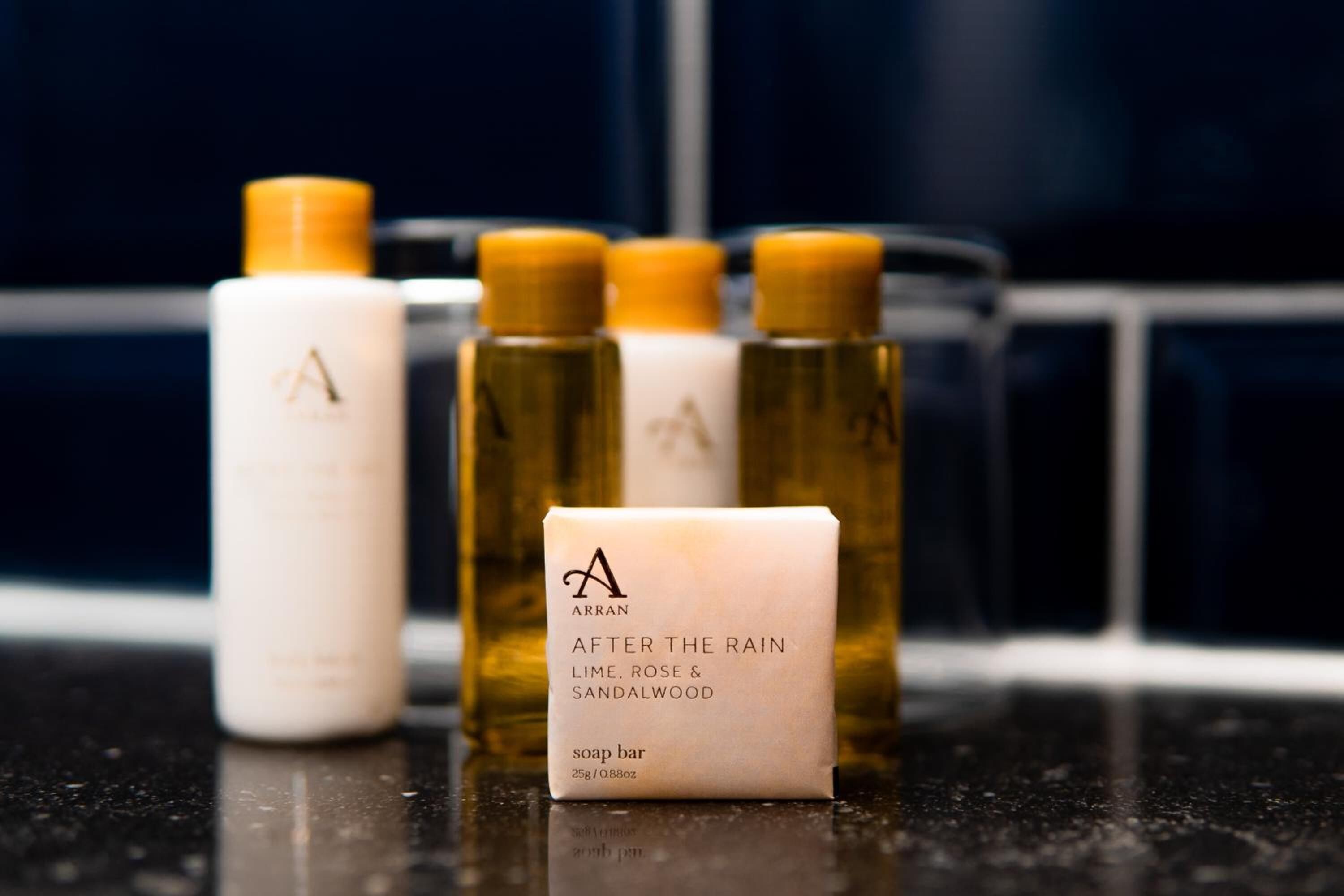 eco-friendly toiletries, bathrobes, slippers, towels