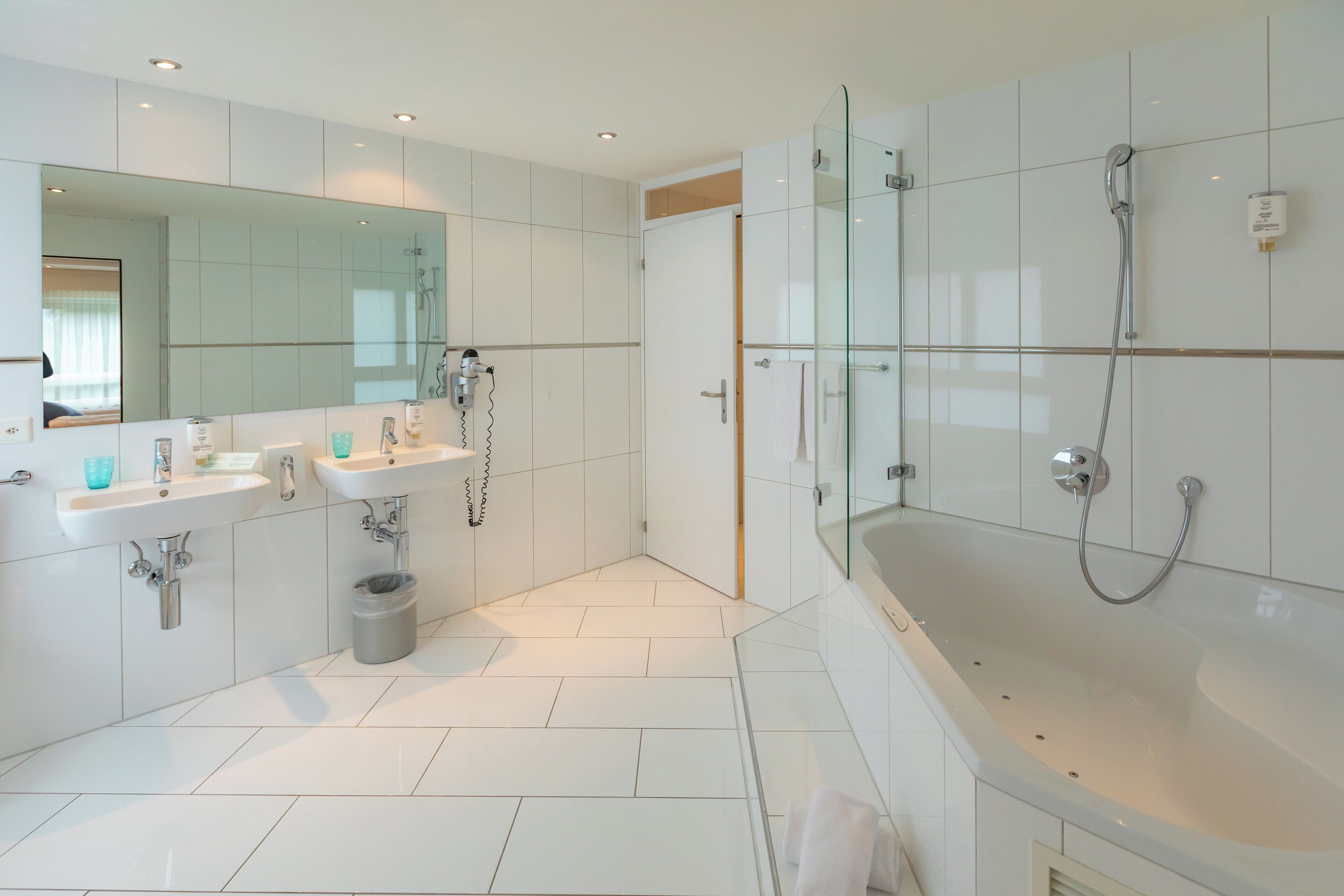 junior suite | bathroom | hair dryer, towels